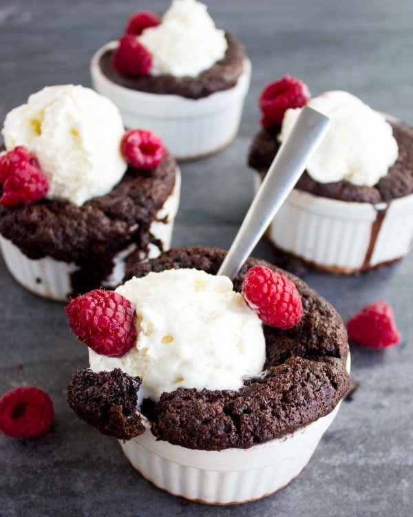 individual Mini Chocolate Pudding Cakes served with ice cream and fresh raspberries