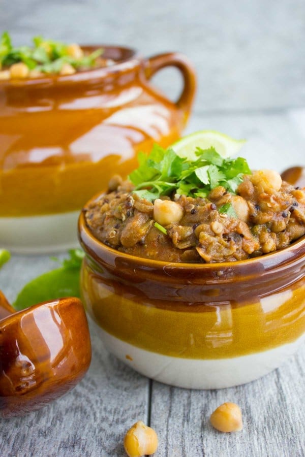 side view of Moroccan Harira Soup topped with cilantro leaves