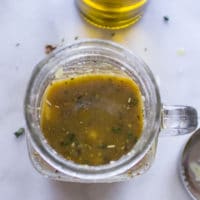 Greek salad dressing in a jar ready to use after shaking!