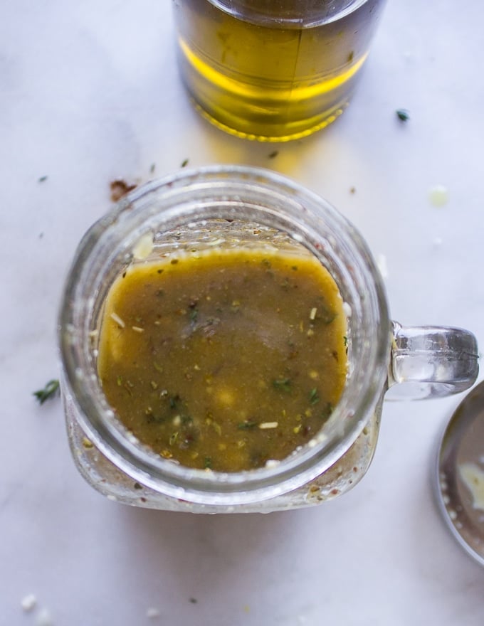 Greek salad dressing in a jar ready to use after shaking!