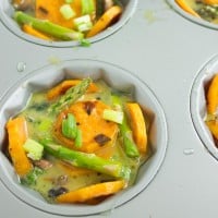 Kale Veggie Mini Frittata in a muffins tin ready to go into the oven.