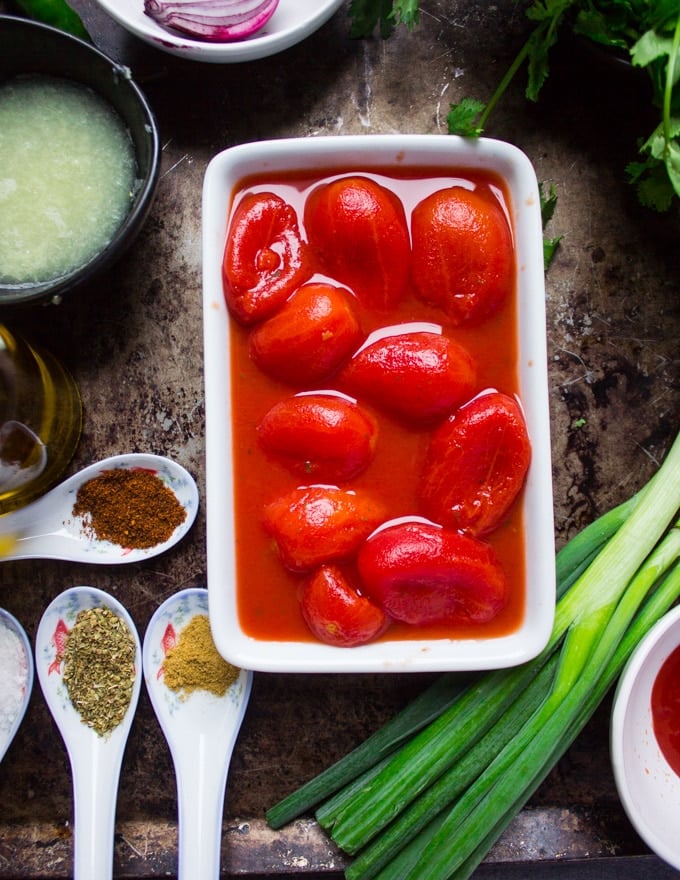 the whole tomatoes in a bowl