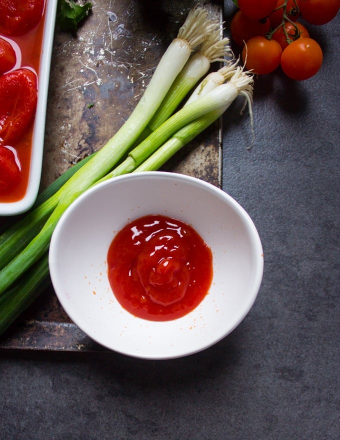 A small bowl of ketchup