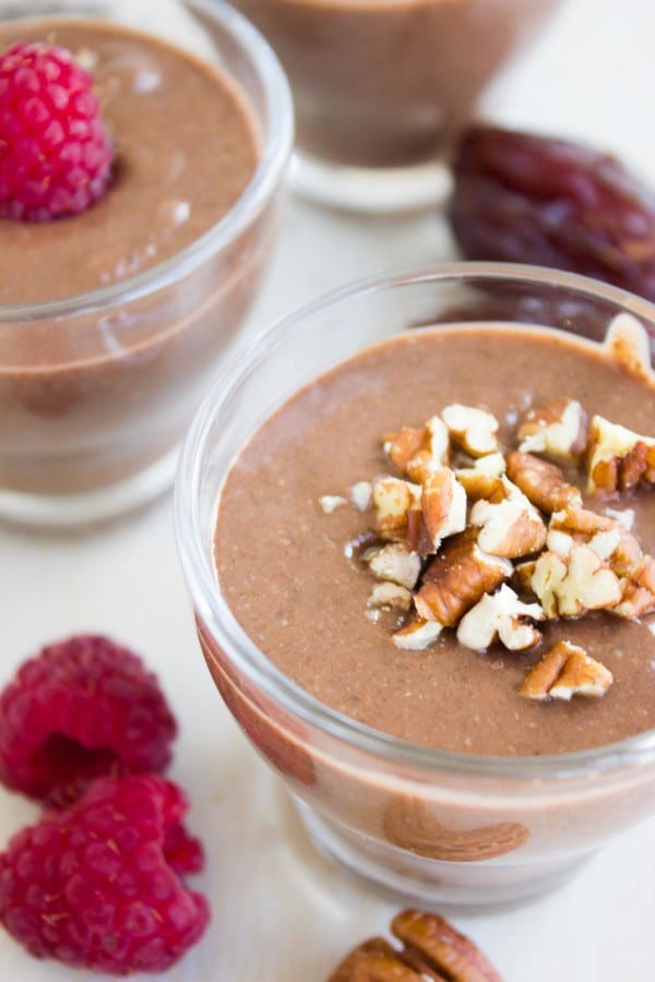 close-up on Instant Chia Chocolate Pudding topped with chopped walnuts
