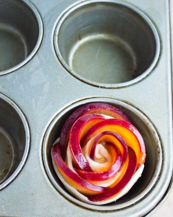 Peach Plum Rose Tarts in a muffin pan ready to go into the oven