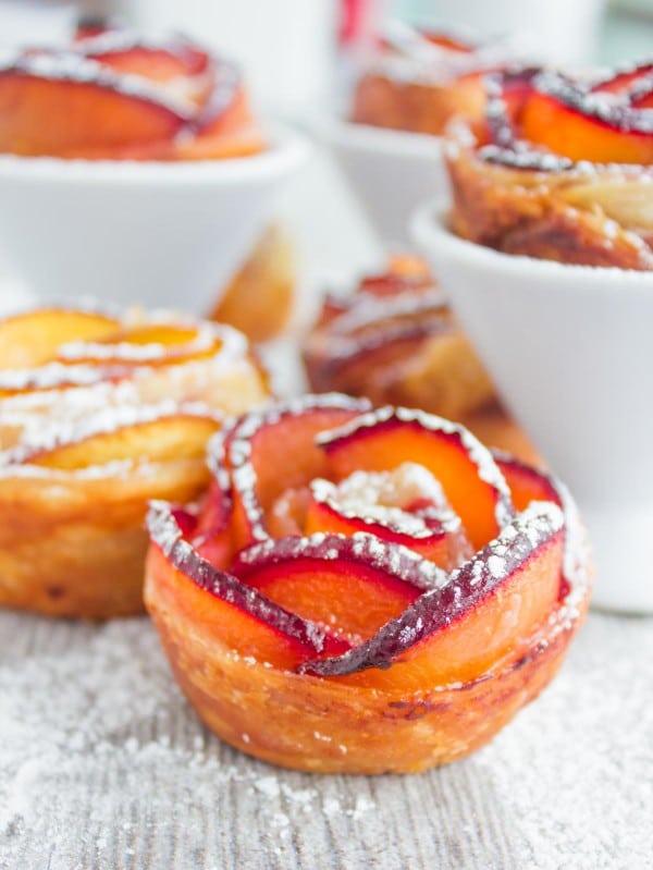 close-up of sugar-dusted Peach Plum Rose Tarts
