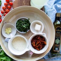 ingredients for the pasta primavera sauce including parmesan, sun dried tomatoes, herbs, garlic and cream cheese