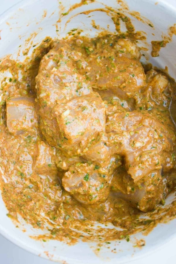 chicken chunks marinating in a mix of Turkish spices and yogurt