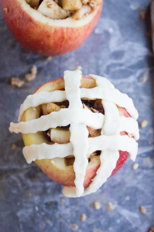 Apple Pie Stuffed Apples being topped with pie lattice