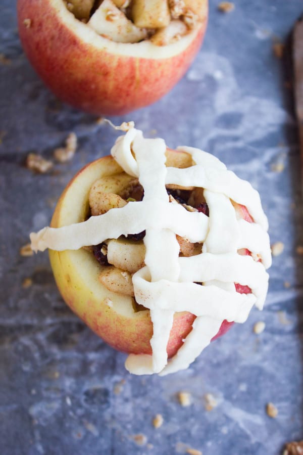 Apple Pie Stuffed Apples being topped with pie lattice