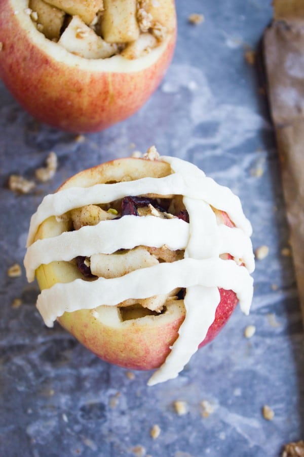 Apple Pie Stuffed Apples being topped with pie lattice