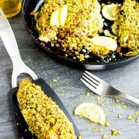 Pesto Pistachio Fish Fillet in a black skillet