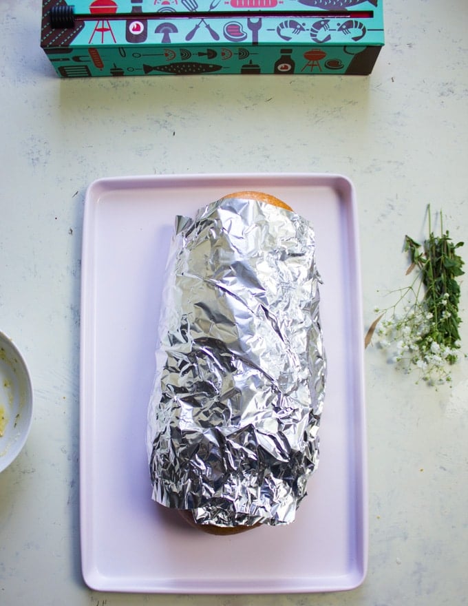 Wrapped up loaf of bread ready to bake
