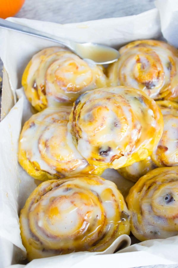 Caramel glazed Pumpkin Cinnamon Rolls in a box