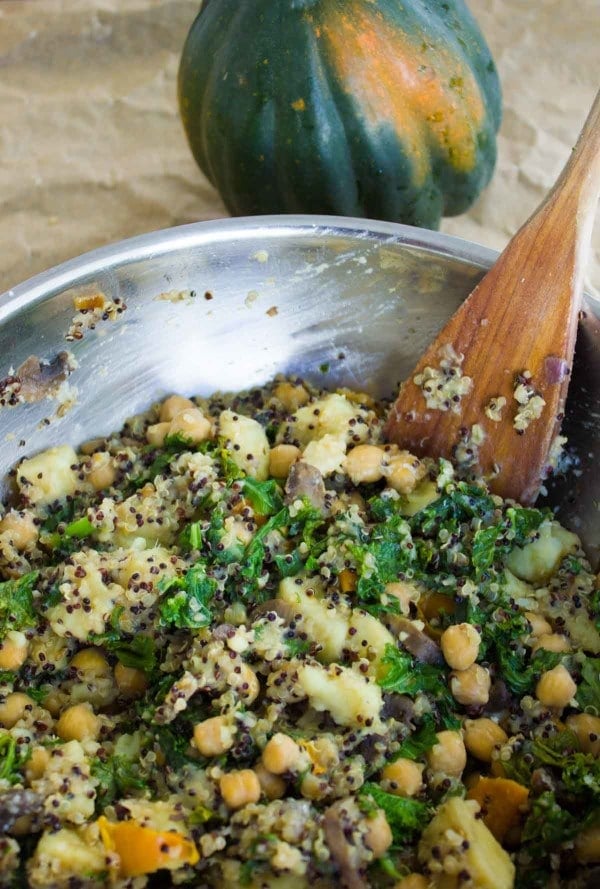 Quinoa Kale Stuffing being mixed in a metal bowl