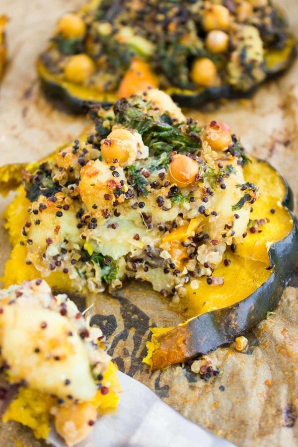 Healthy Vegetarian Quinoa Kale Stuffing served on baked acorn squash rings