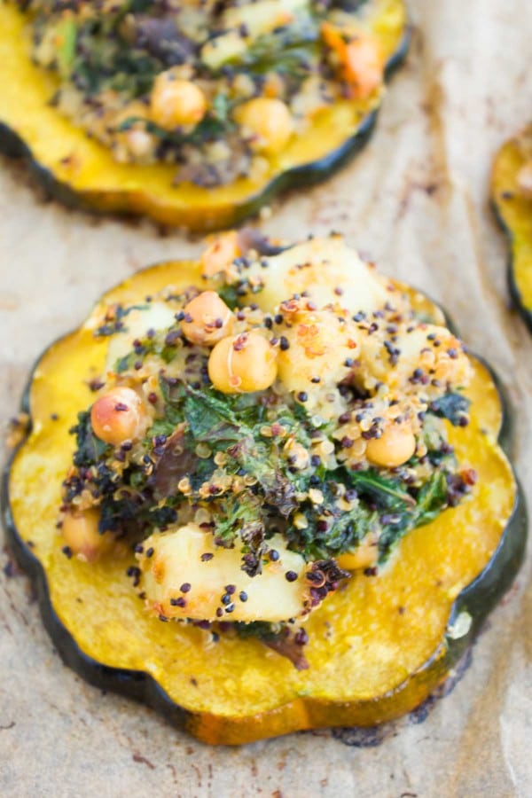 Quinoa Kale Stuffing served in baked acorn Squash Rings on a baking tray