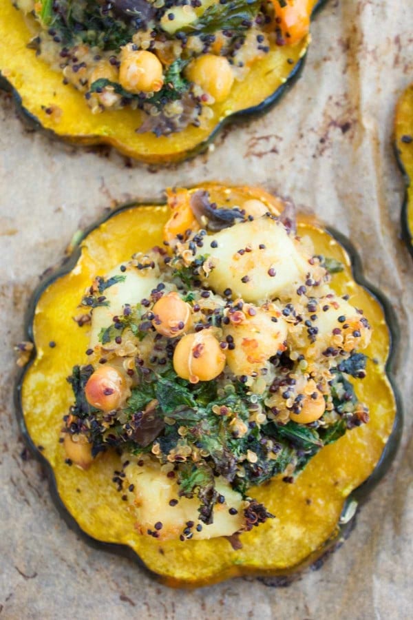Quinoa Kale Stuffing piled up and baked on acorn Squash Rings