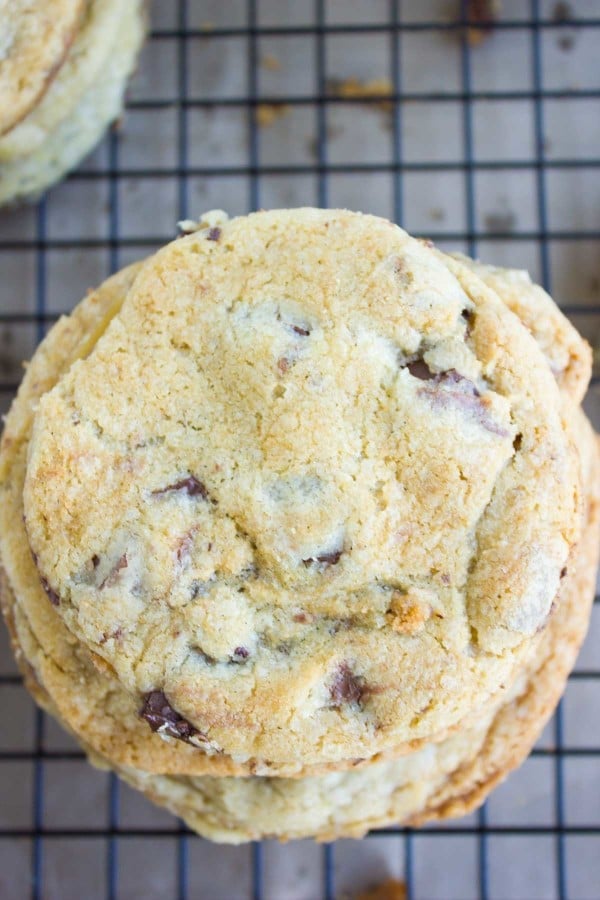 Nutella-Stuffed Chocolate Chip Cookies stacked on top of one another