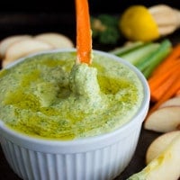 Garlic Kale Hummus Dip. Hands down the best hummus you'll every have! Smooth, creamy , vegan, gluten free and tastes delicious! www.twopurplefigs.com