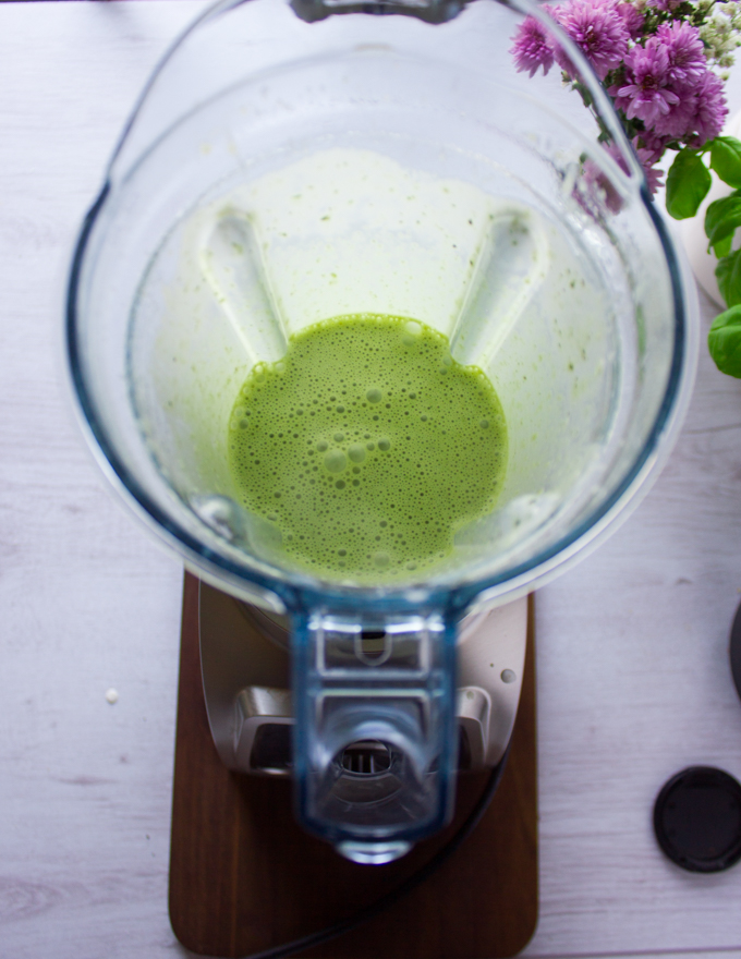 The basil béchamel in the blender is ready and green