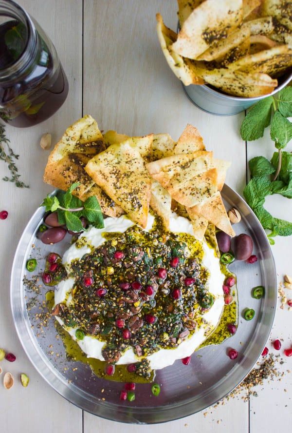 Labneh Dip with zaatar topping and pomegranate seeds served as a Super Bowl Dip