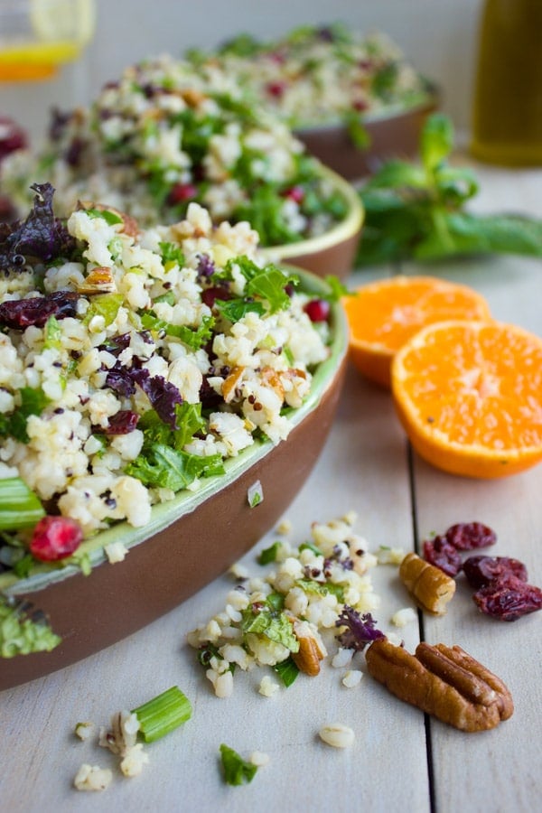 Mixed Grain Kale Citrus Salad. A zesty vibrant fresh salad you can serve warm, cold, picnic day, busy day or for lunch next day! Perfectly Vegan and loaded with grain goodness! Get the recipe for this salad and a citrus salad dressing you'll make over and over again! www.twopurplefigs.com