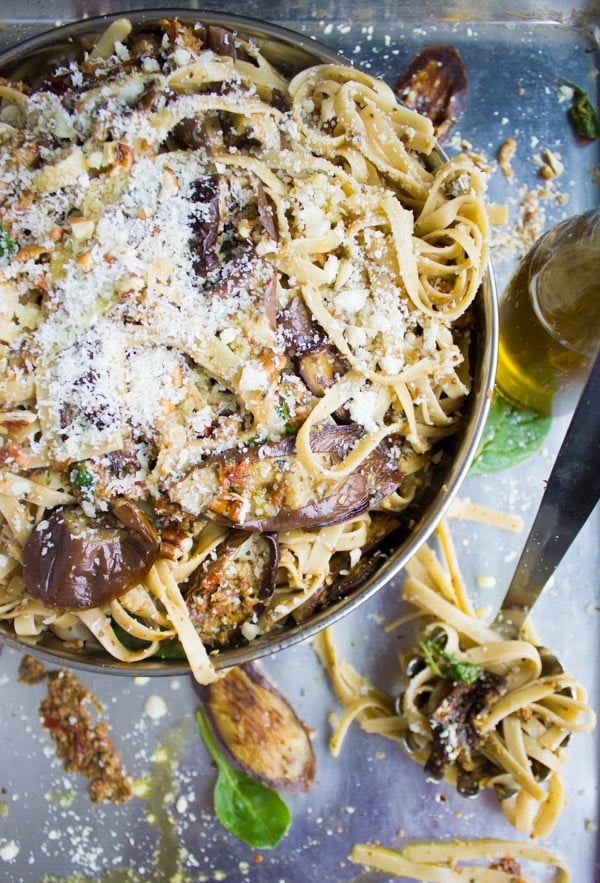 Skinny Eggplant Parmesan Pasta in a bowl topped with lots of grated parmesan