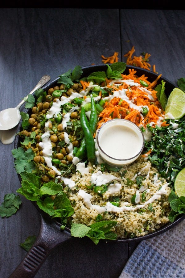 Tahini sauce drizzled over all the vegan Moroccan couscous salad