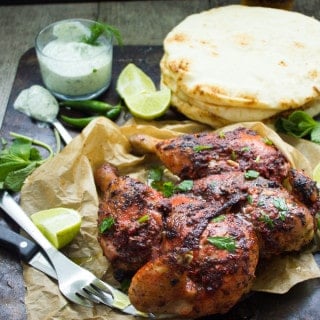 Quick Roast Tandoori Chicken. This absolutely the ONE and only way to make a tandoori chicken without marinating and long hours of waiting! No special ovens needed, just a LOAD of flavors and a secret tip to speed p the roasting! Get this all time favorite recipe and see for yourself! www.twopurplefigs.com