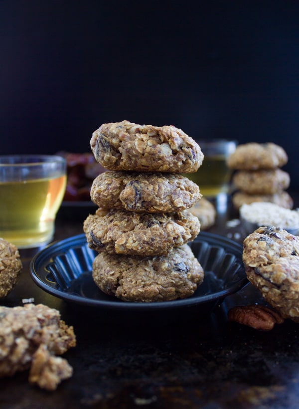 side view of a stack of Vegan Oatmeal Raisin Cookies with almond butter and dates