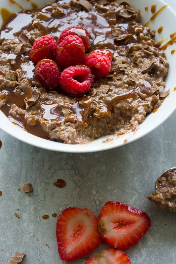 Chocolate Oatmeal Breakfast Bowl. the best way to start your morning--filling, healthy, let chocolate-y--get the recipe with ideas and tips to make this into a healthy breakfast bowl or a chocolate dessert! www.twopurplefigs.com
