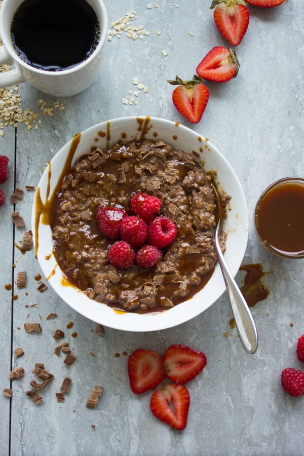 Chocolate Oatmeal Breakfast Bowl. the best way to start your morning--filling, healthy, let chocolate-y--get the recipe with ideas and tips to make this into a healthy breakfast bowl or a chocolate dessert! www.twopurplefigs.com