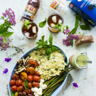 Summer Pasta Salad Platter With Sweet Tea Dressing. This will be our go to BBQ, picnic, potluck and all Summer long favorite! Platter style make your own pasta salad and an amazing herb sweet tea dressing to drizzle, plus get tips for throwing the perfect BBQ party! #SummerTastes www.twopurplefigs.com