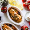 Finished Baked Salmon with Greek Dressing in ramekins for serving.