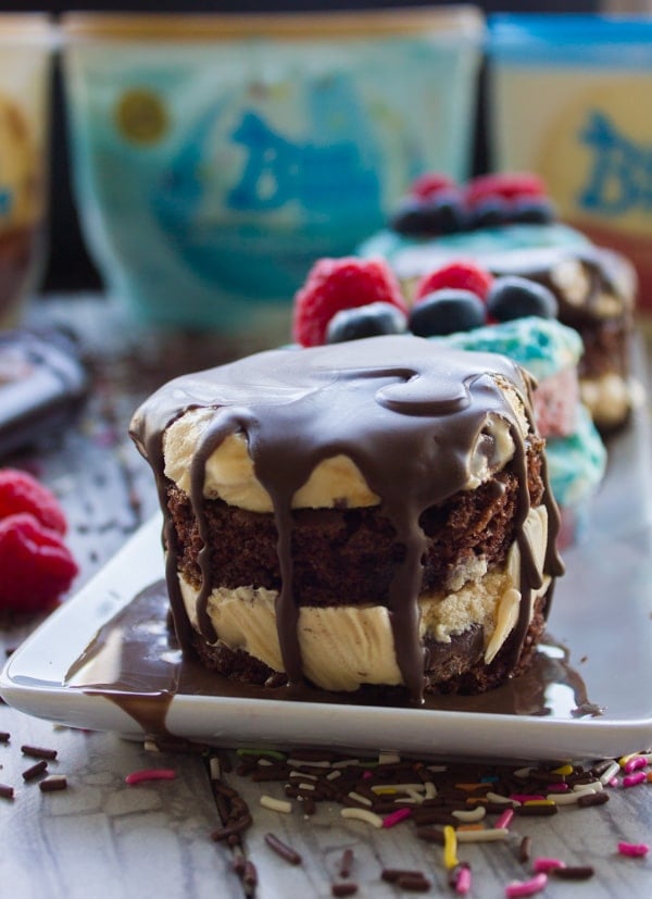 side view of a chocolate and salted caramel mini ice cream cake on a white plate