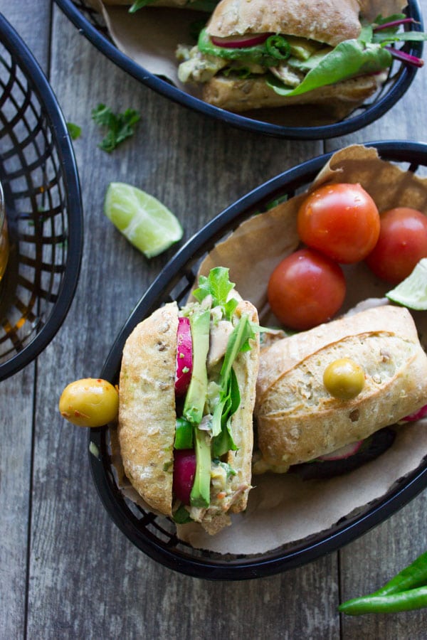 Spicy Chunky Tuna Sandwich with avocado, radishes and a no-mayo tuna salad served in little bread baskets