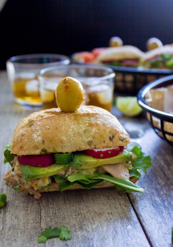 side view of Spicy Chunky Tuna Sandwich held together with a toothpick