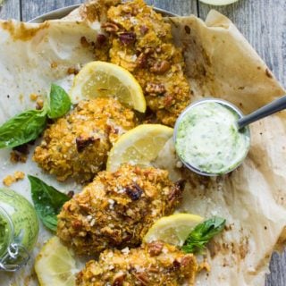 Pecan Crust Baked Chicken Tenders. Super flavor packed chicken tenders coated in plenty of pecans and baked till crunch perfection! Succulent, quick and easy chicken dinner that's a real crowd pleaser every single time! Served with a fresh basil dip! www.twopurplefigs.com