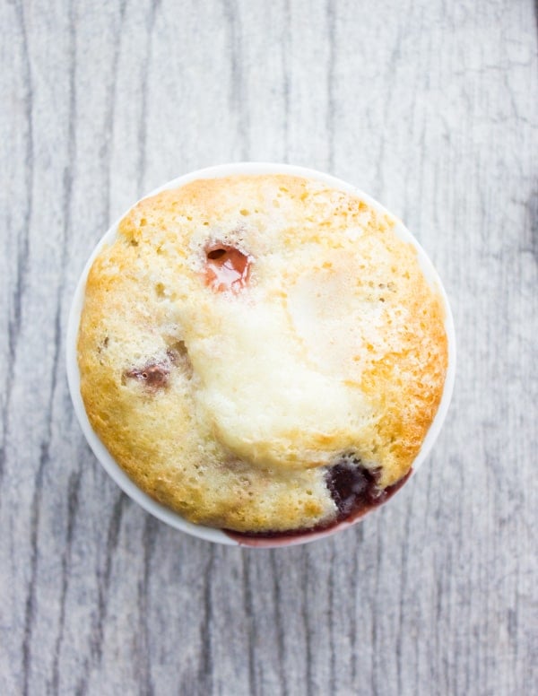 a small ramekin with freshly baked cherry buckle