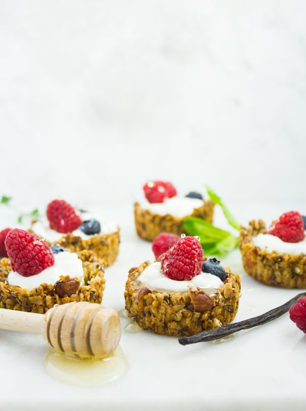 Healthy Breakfast Granola cups filled with Greek yogurt and berries