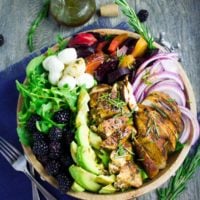Italian Balsamic Chicken Salad with blackberry dressing in a salad bowl