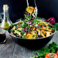 Sweet Persimmon Apple Kale Salad Recipe. Festive, rainbow goodness salad that's quick, light as air, crunchy, sweet and vegan. Dressed up with a sweet secret ingredient dressing! www.twopurplefigs.com