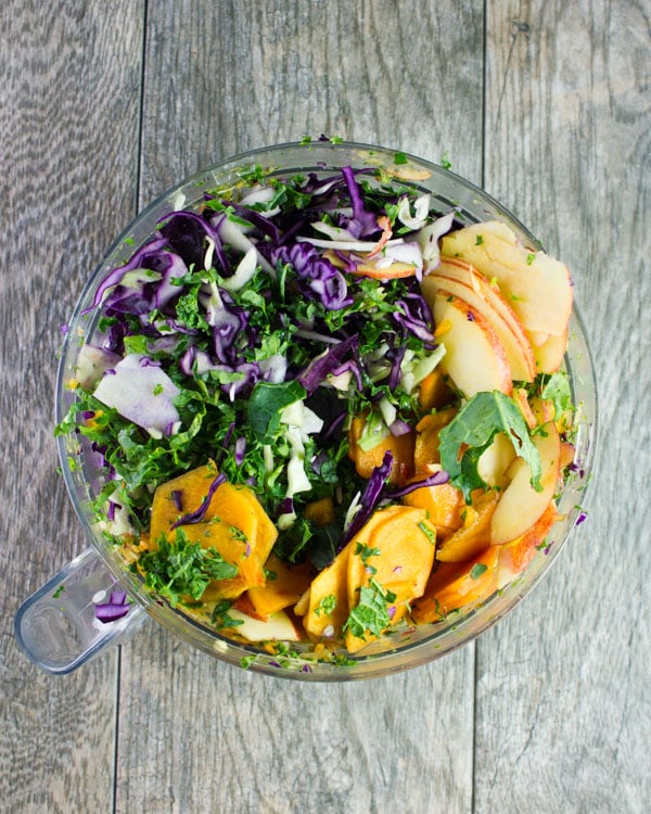 ingredients for kale salad gathered in a food processor bowl