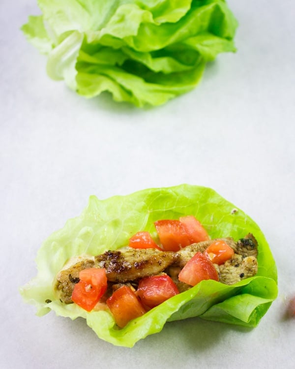 Chicken Shawarma Lettuce Cups with diced tomatoes on top