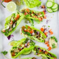 Chicken Shawarma in Lettuce Cups. Get the ultimate way to go healthy with a flavor packed succulent chicken shawarma served in lettuce cups. Hummus and all your favorite toppings included--a step by step recipe you need to make! www.twopurplefigs.com