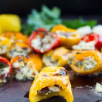 Mini Zesty Feta Stuffed Peppers. The freshest, easiest and quickest appetizer you'll ever make! Perfect for BBQ season or made in the broiler! Sweet, salty, spicy and utterly delicious. www.twopurplefigs.com