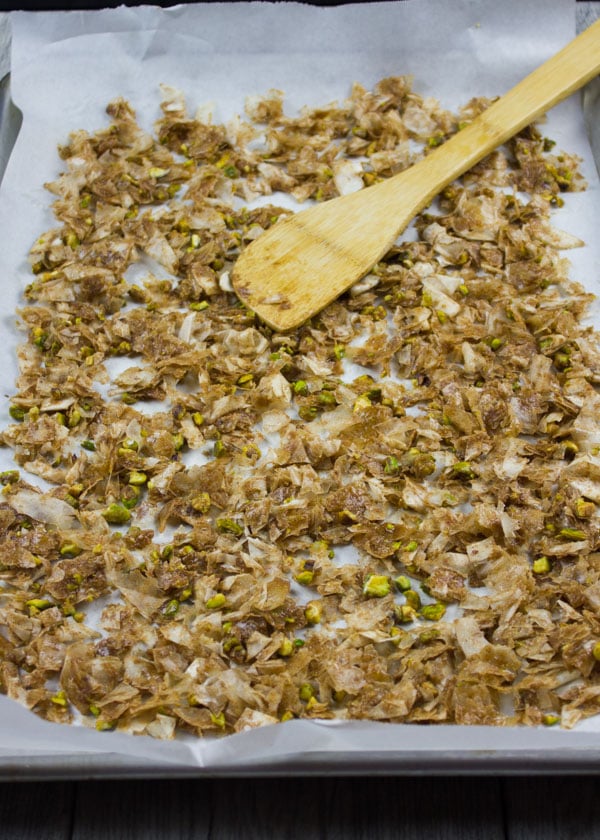 baklava crumbles ready to be baked on a baking sheet