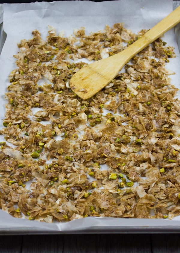 baklava crumbles ready to be baked on a baking sheet