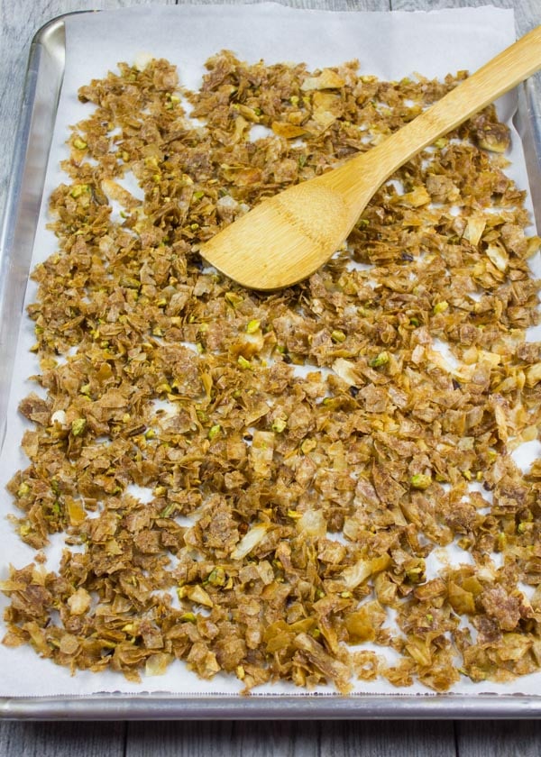 Ready baked crunchy Baklava Crumbles on a baking sheet